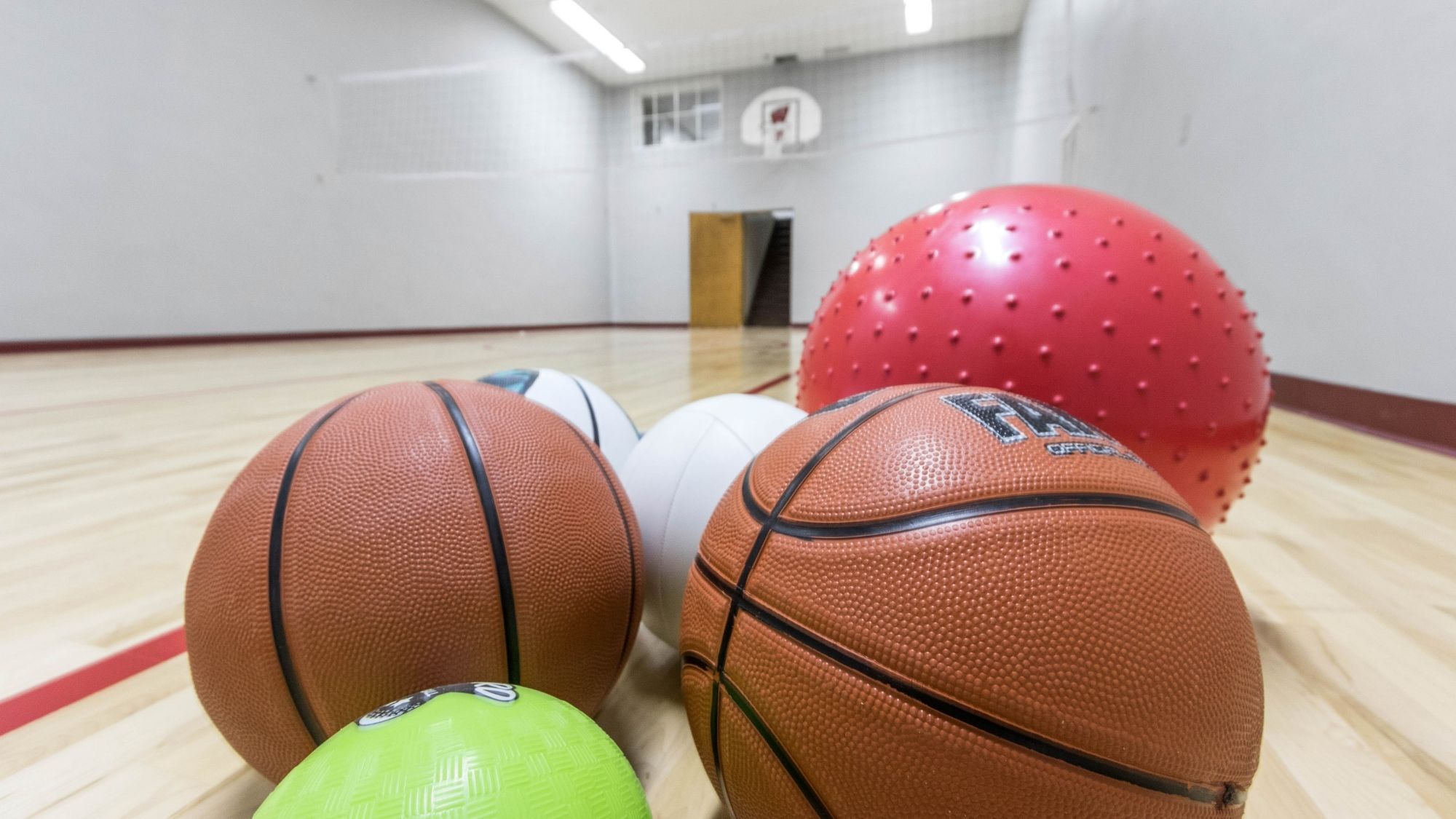 Basketballs at Preble Hills' indoor basketball court